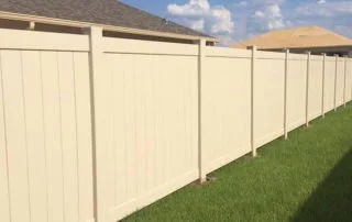 wooden vinyl aluminum fence around a house