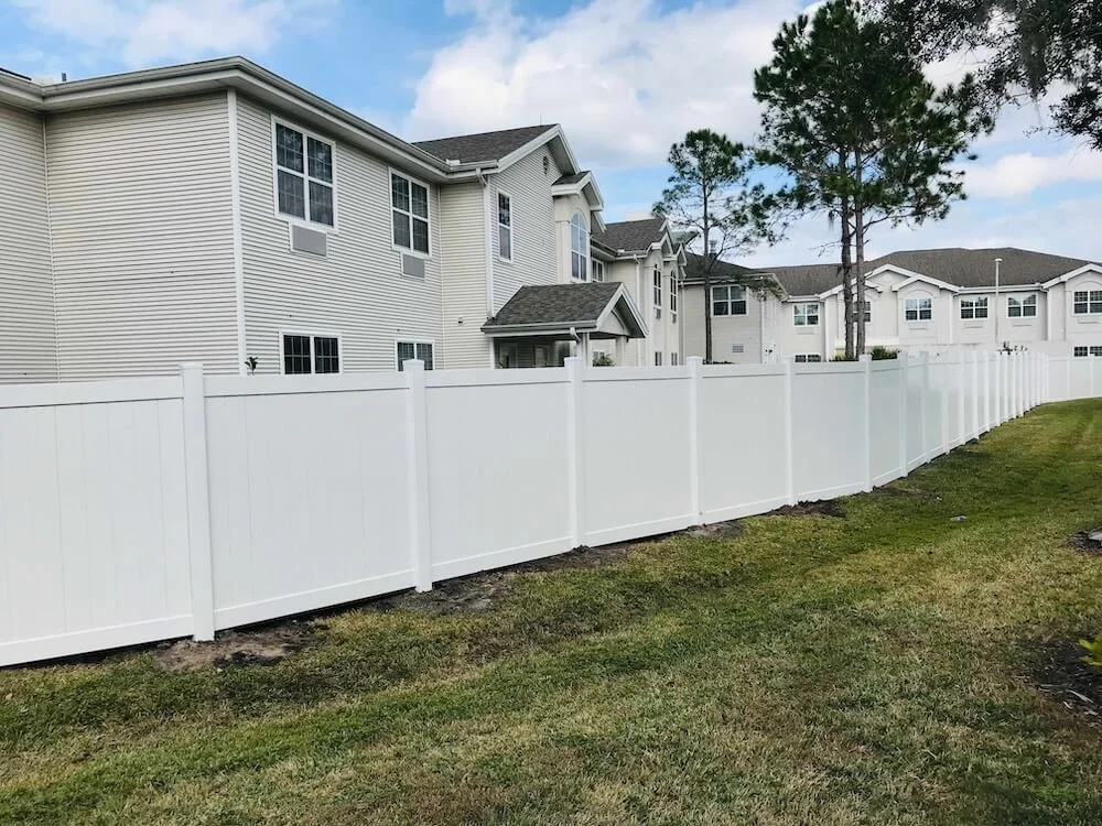 vinyl fence around a house