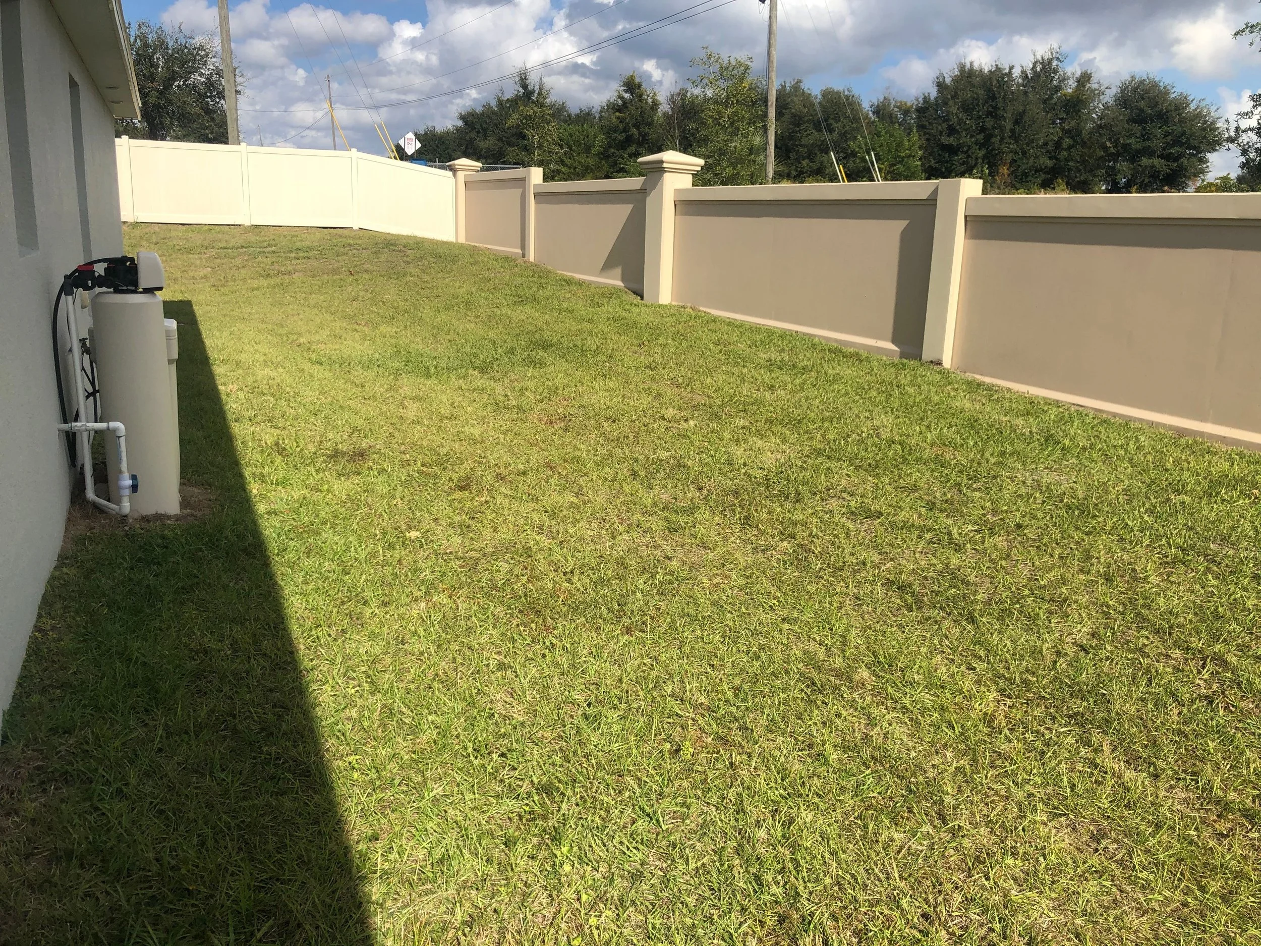 vinyl fence around a house