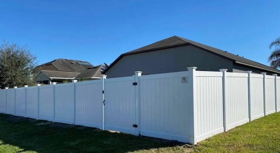 vinyl fence around a house