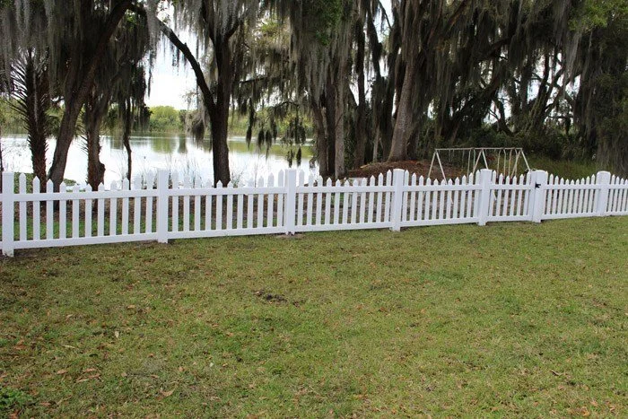 wooden vinyl aluminum fence around a house