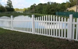 wooden vinyl aluminum fence around a house