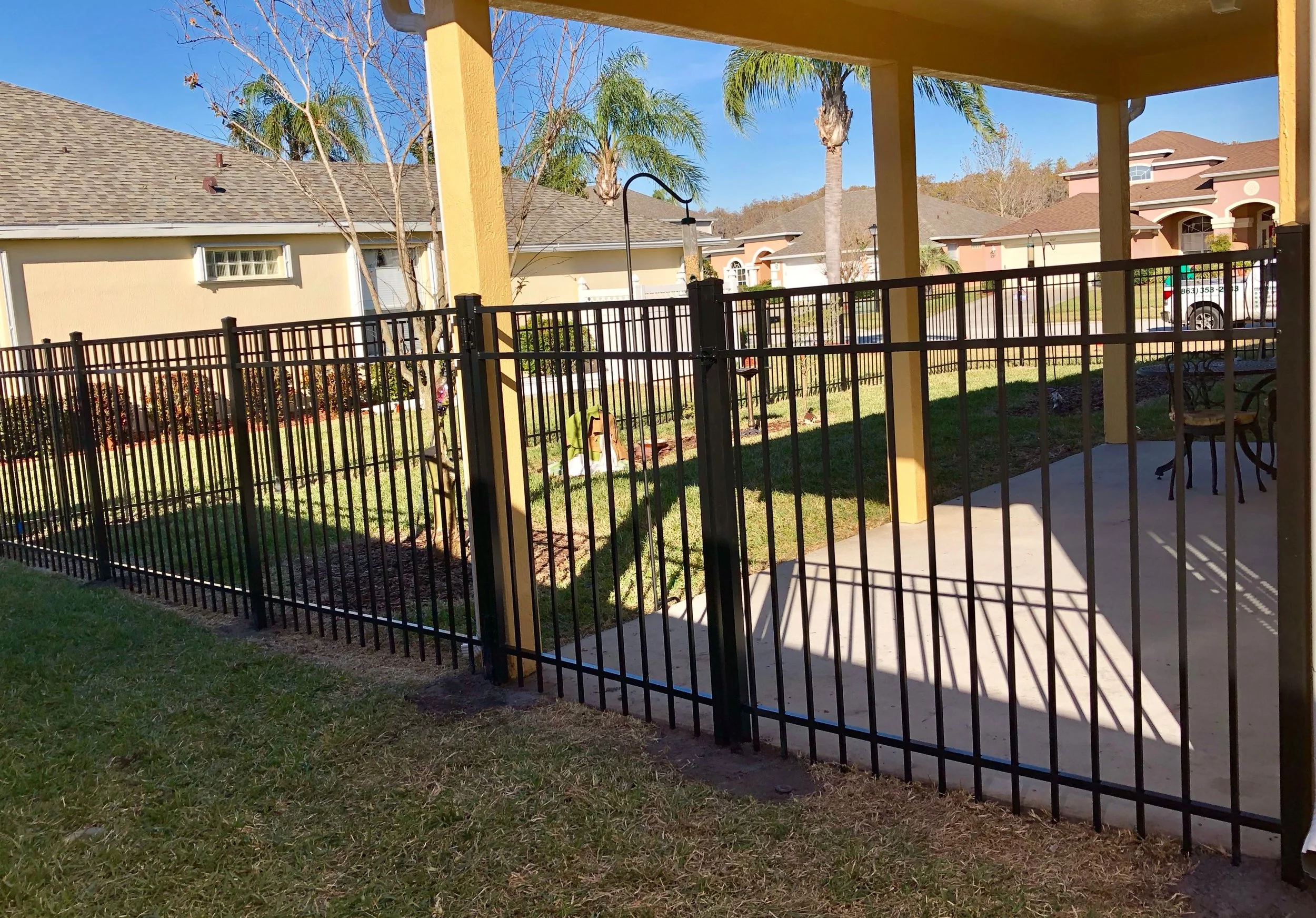 aluminum fence around a house