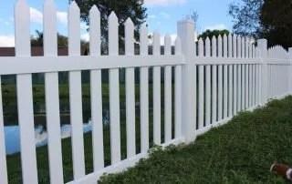 wooden vinyl fence around a house