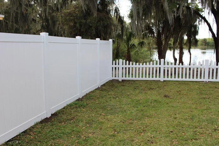 wooden vinyl aluminum fence around a house
