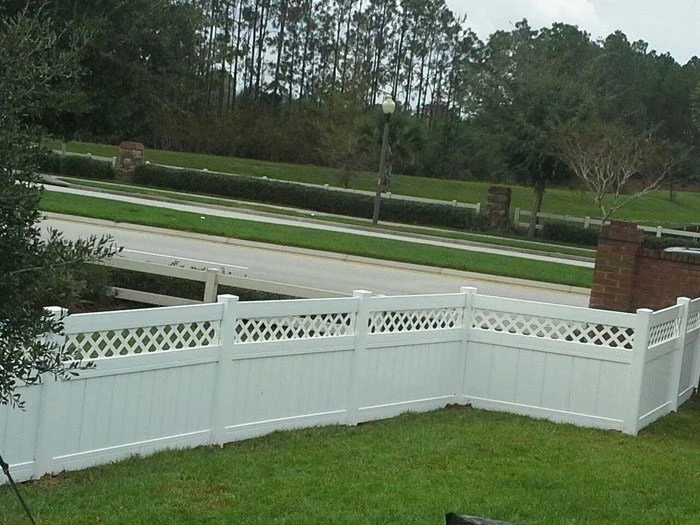 wooden vinyl aluminum fence around a house