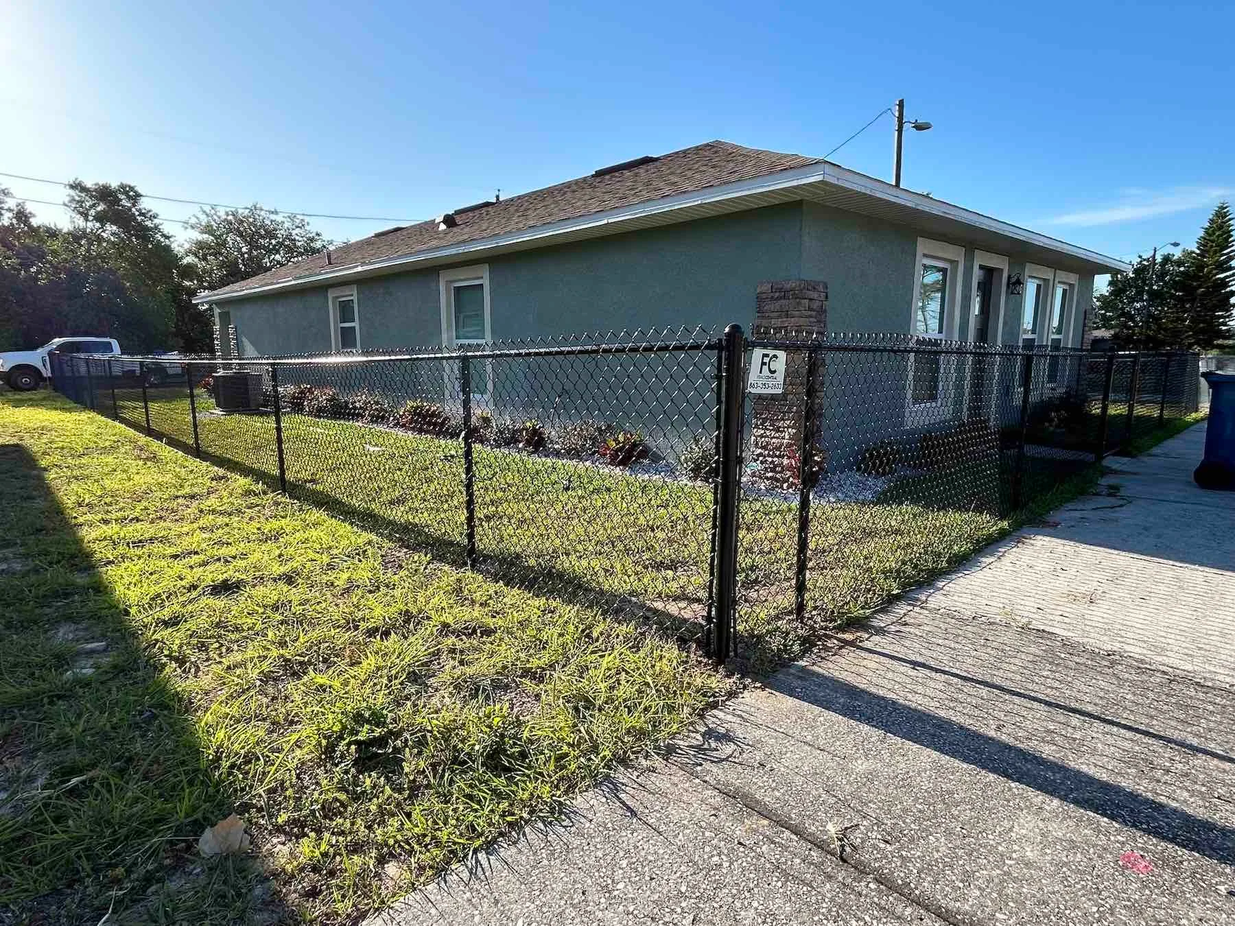 aluminum fence around a house