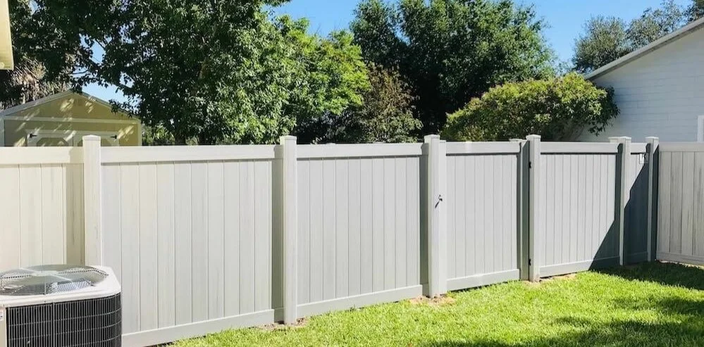 vinyl fence around a house