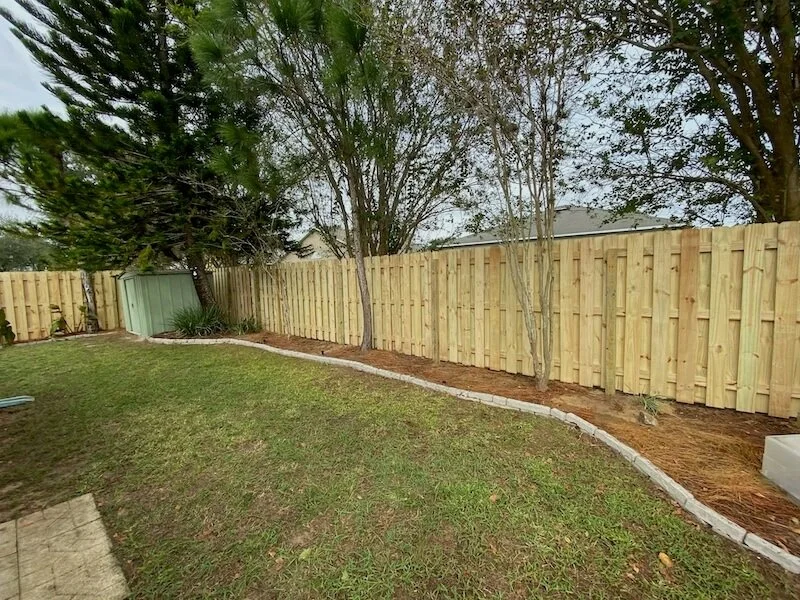 wooden fence around a house
