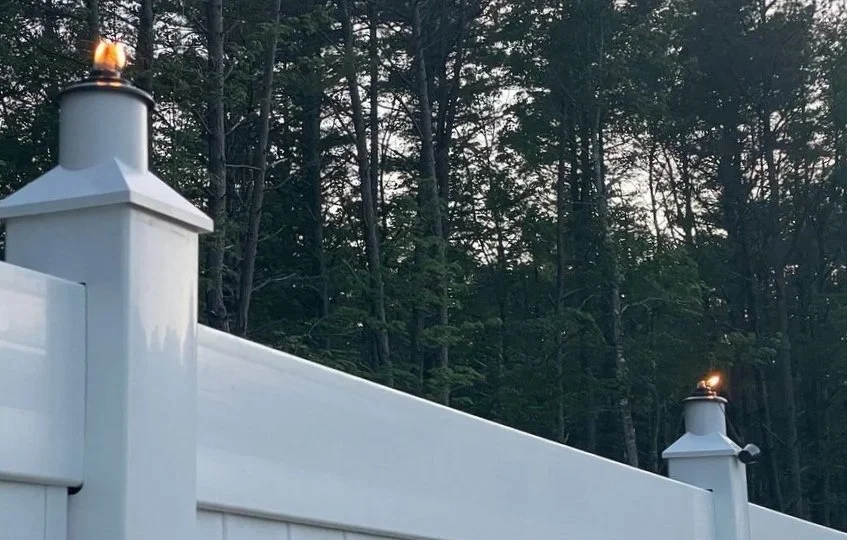 vinyl fence around a house