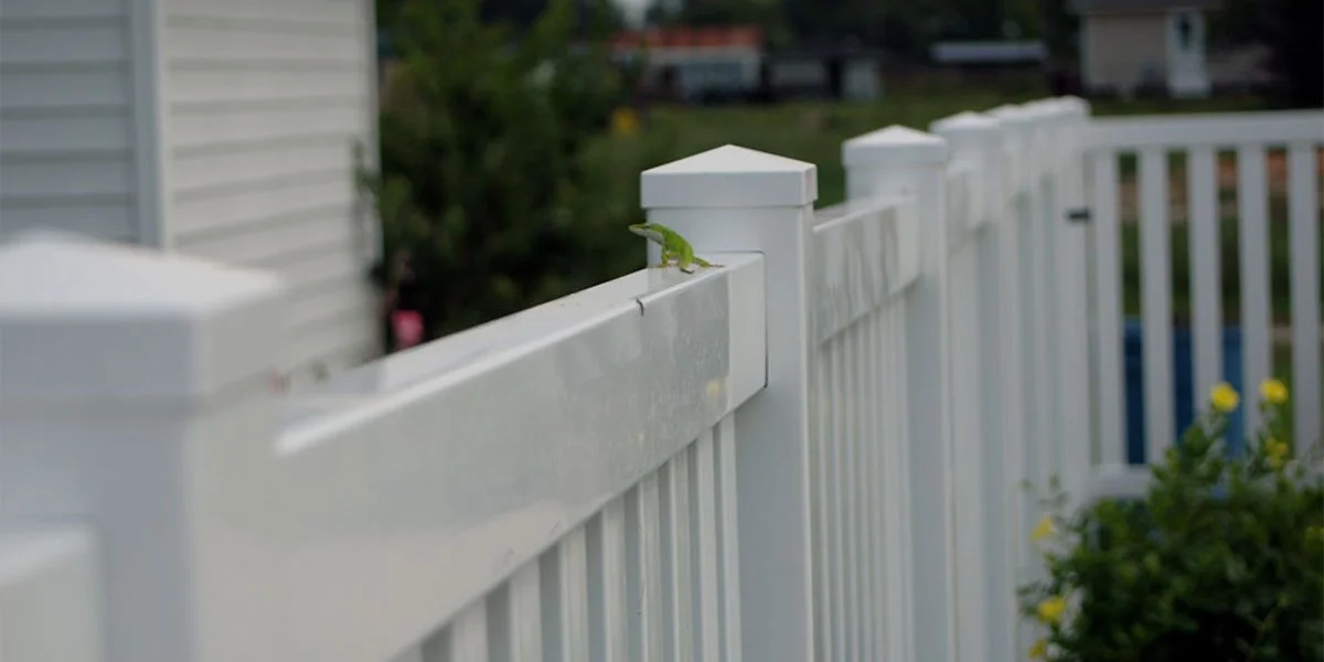 wooden vinyl aluminum fence around a house