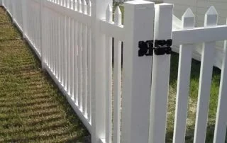 wooden vinyl fence around a house